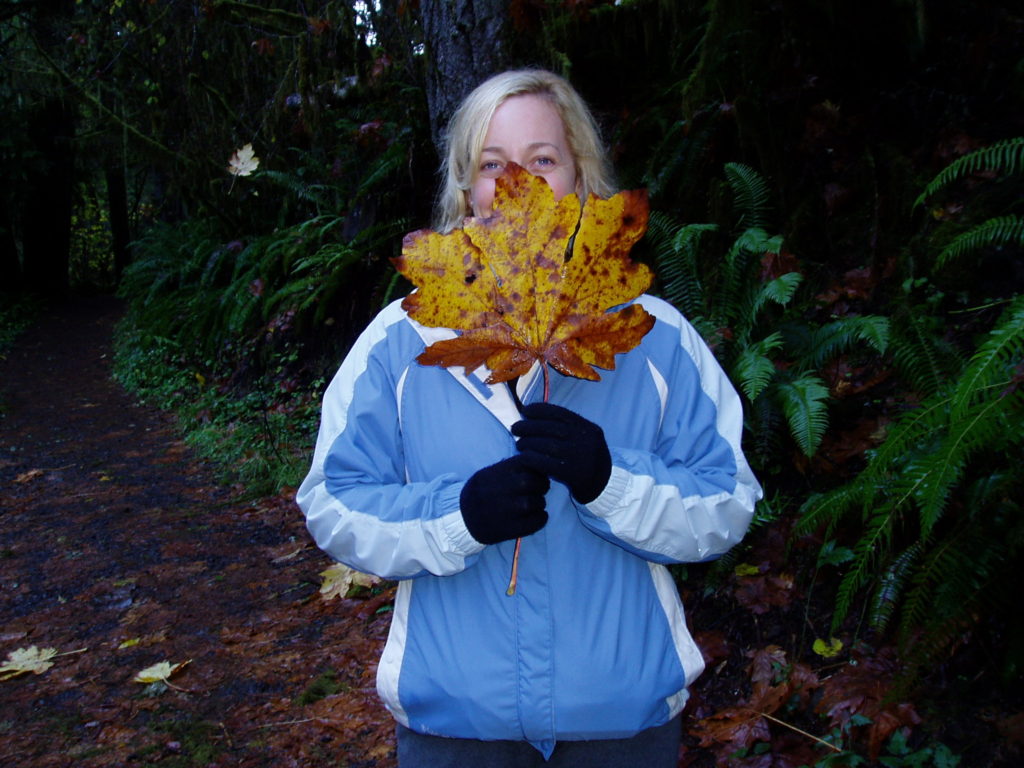 Woman holding maple leaf